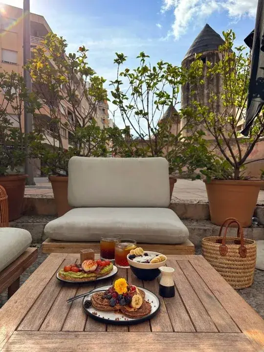 Brunch on the SĀNTAL terrace with views of the 17th-century windmill, to share for two
